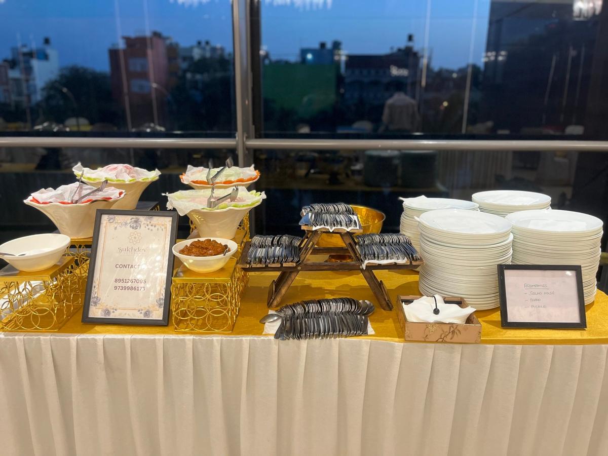 Accompaniments station with salad, papad and pickle