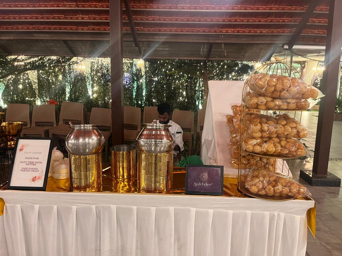 Live chaat counter with paani puri and aloo tikki at a Bangalore reception